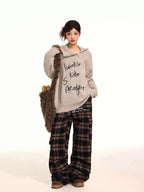 グレー刺繍ハイネックジップニット