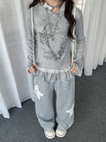 Star Ruffle Hem Long Sleeve Tee oliviroa オリヴィオラ