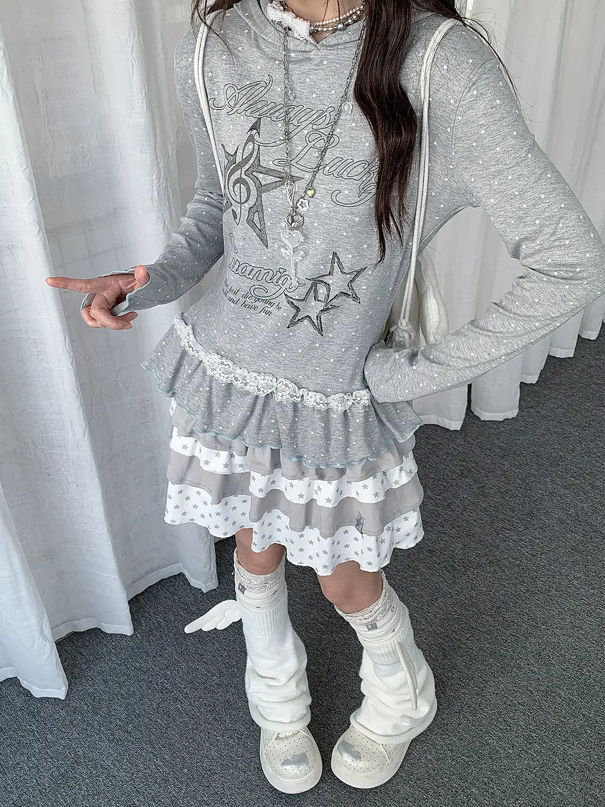 Star Ruffle Hem Long Sleeve Tee OL2392