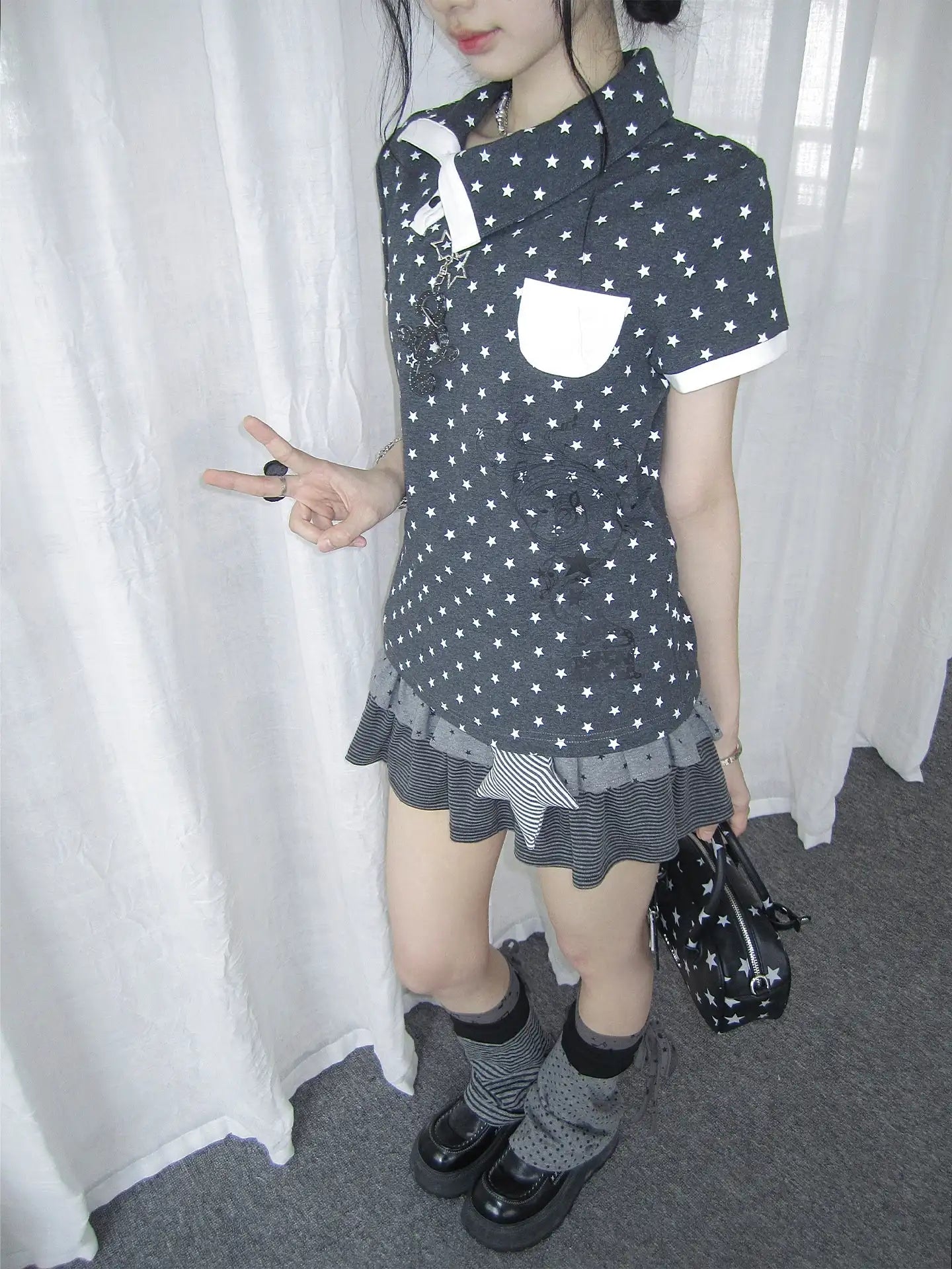 Allover Star Asymmetric Polo Tee oliviroa オリヴィオラ