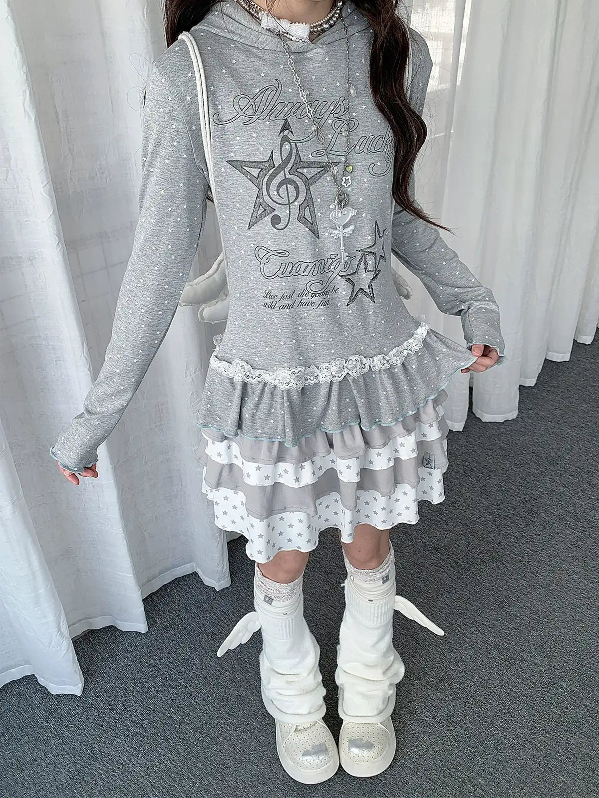 Star Ruffle Hem Long Sleeve Tee OL2392