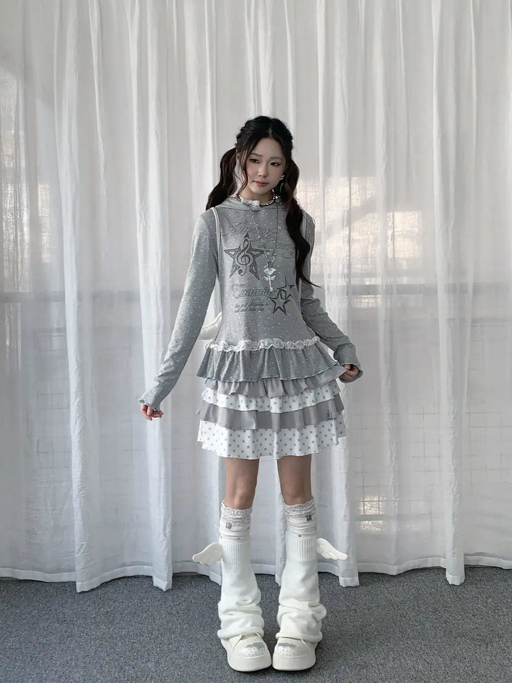 Star Ruffle Hem Long Sleeve Tee OL2392
