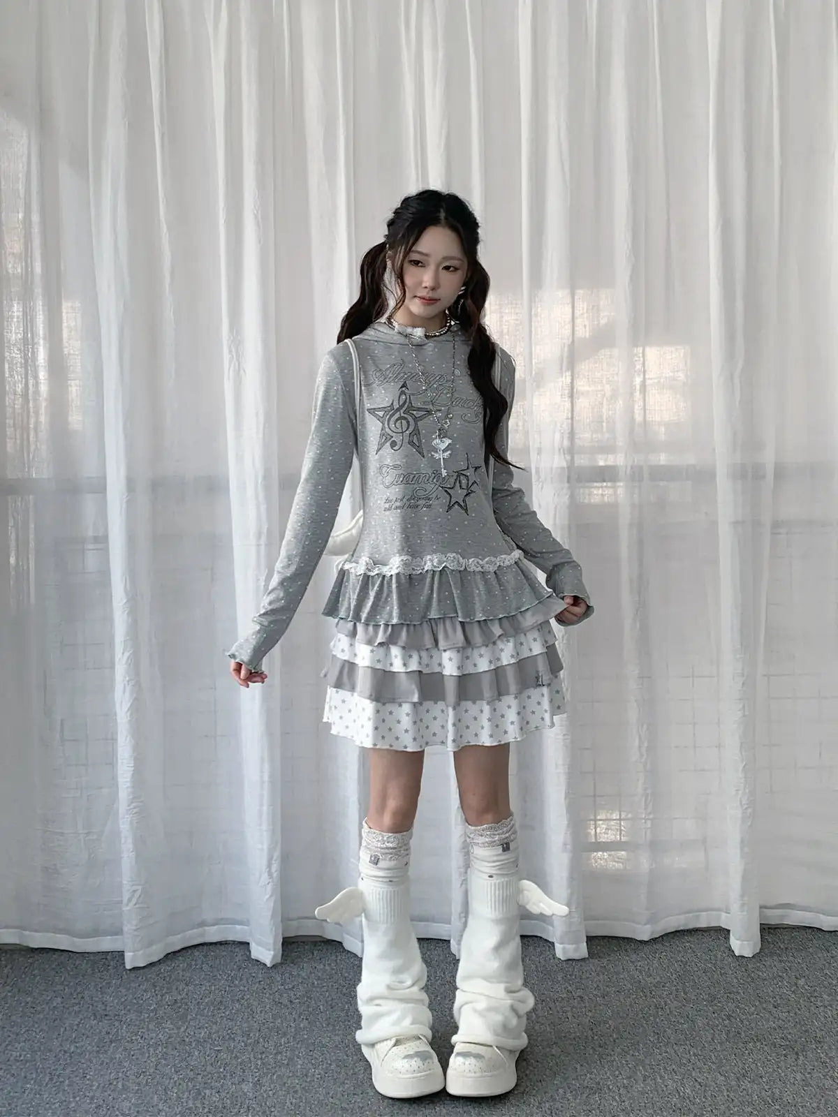Star Ruffle Hem Long Sleeve Tee OL2392