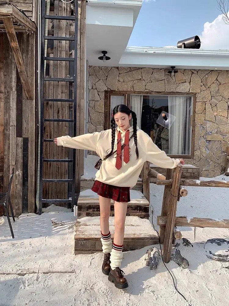 リボン付き刺繍フーディ